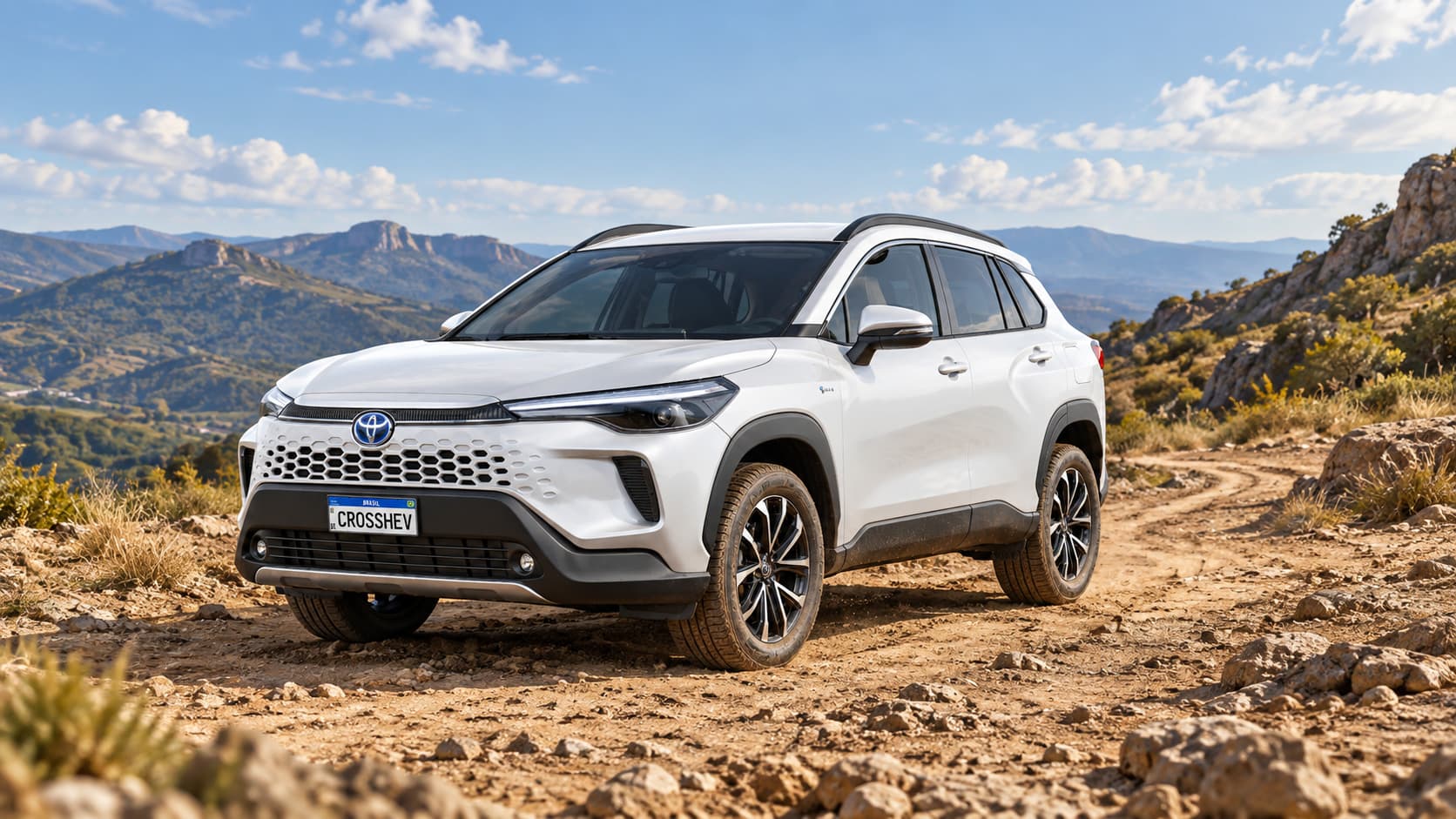 Toyota Corolla Cross branco em uma paisagem montanhosa